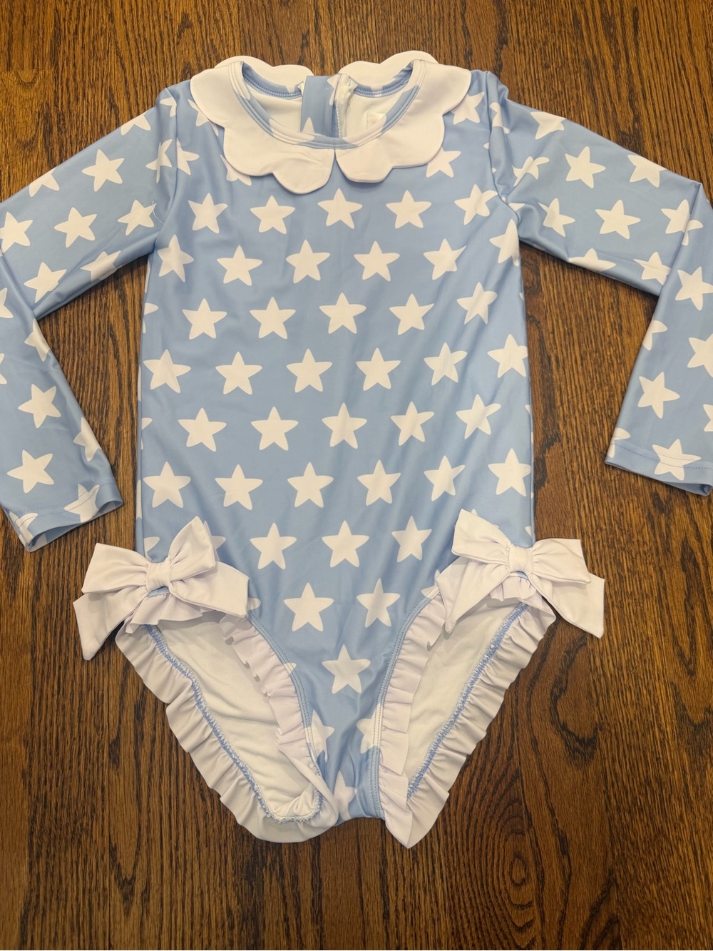 Kids Long-Sleeve One-Piece Swimsuit in Light Blue with White Stars
